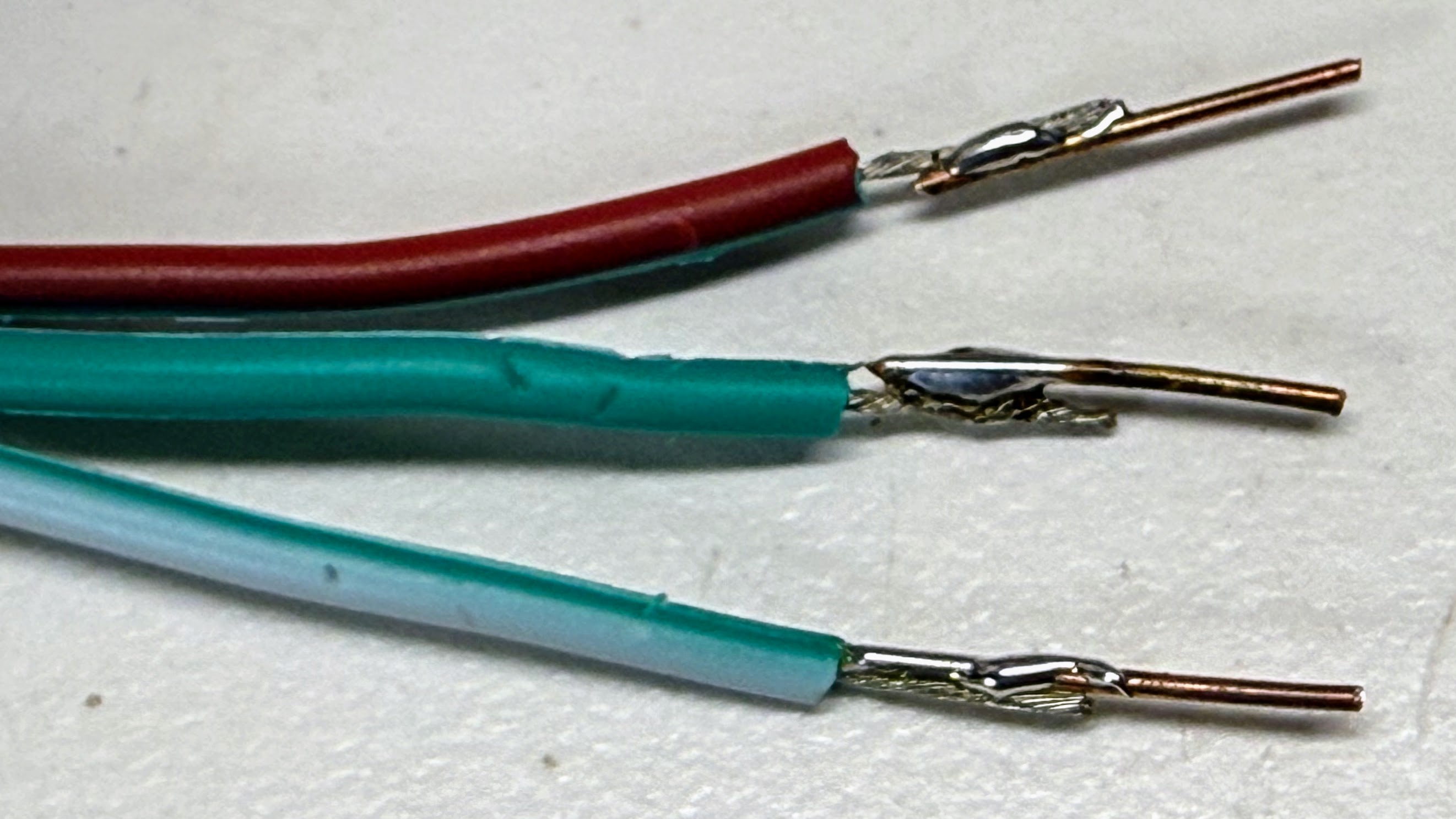 22-gauge solid core wire soldered onto the stranded strip leads
